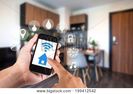 Hand Using Smartphone By App Smart Home On Mobile For Remote Control Everything In Home By Wifi Netw