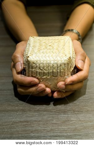 a box for sticky rice at restaurant