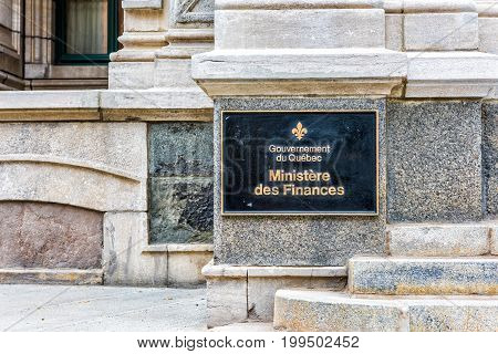 Quebec City Canada - May 29 2017: Old town street with entrance to Ministry of Finances Government closeup