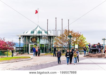 Quebec City Canada - May 30 2017: Old town view of Frontenac building gazebo gift shop and people on dufferin terrace