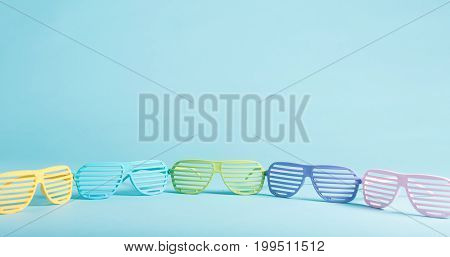 Shutter shades party glassess on a bright background