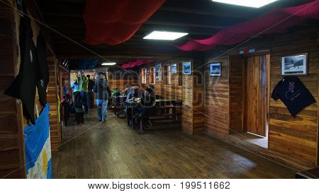 Parque Nacional Cotopaxi, Cotopaxi / Ecuador - August 11 2017: Tourists eating inside the Jose Rivas refuge located at 4800 meters in the volcano Cotopaxi