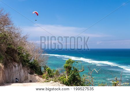 Raraplane Flying In The Beautiful Sky. Tropical Bali Island, Indonesia. Extreme Sport.