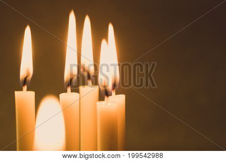Group Of Still Life  Golden Candle Light With Reflection On Soft Red Blurred  Background. Abstract B