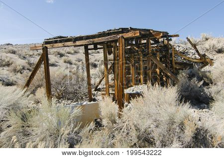 Boarded up old pumice mine shaft Mono County California