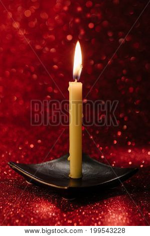Still Life Golden Candle Light With Reflection On Red Blurred Bokeh Background. ,abstract Background