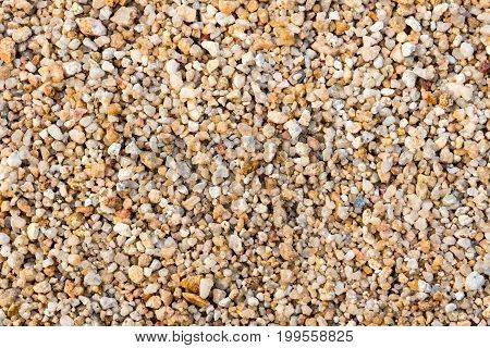 Pattern of rough sand pebbles texture and background.
