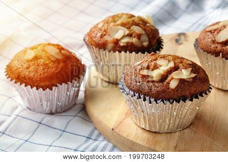 Banana cupcakes very yummy and delicious banana cake and almond toping. Color filter and flare added.