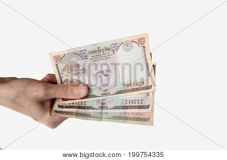 Woman Holding Thirty Nepal Rupees Notes In Her Hand