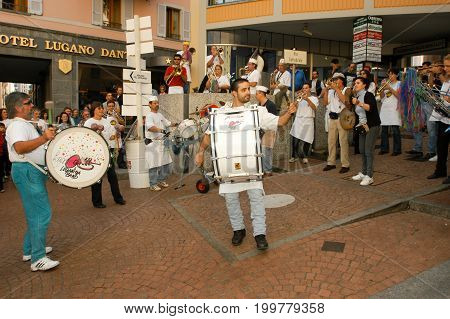 People Performing Gugge Music At The Carnival Of Lugano