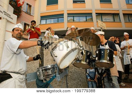 People Performing Gugge Music At The Carnival Of Lugano