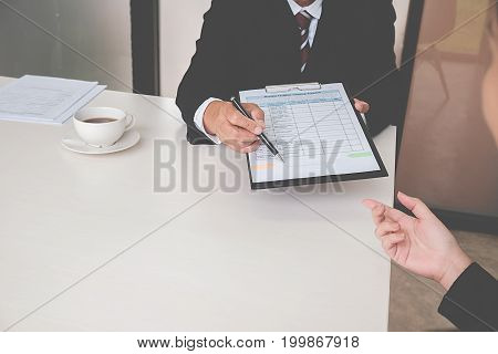 Interview  about to sign a legal document which would be a binding mutual agreement