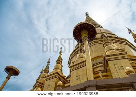 Large Golden Temple With Sky Background, Name Is Phra Maha Chedi Srivang Chai, Located In Lamphun, T