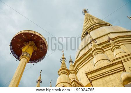 Large Golden Temple With Sky Background, Name Is Phra Maha Chedi Srivang Chai, Located In Lamphun, T