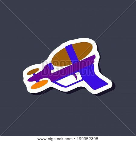paper sticker on stylish background Toy gun