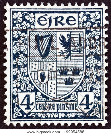 IRELAND - CIRCA 1922: A stamp printed in Ireland shows Arms of the four provinces, circa 1922.