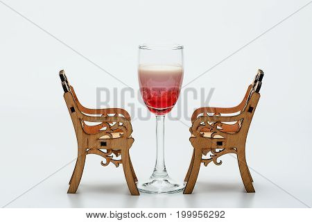 Alcohol Cocktail Singapore Sling With Chairs