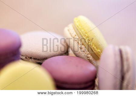 cooking, confectionery and baking concept - close up of macarons