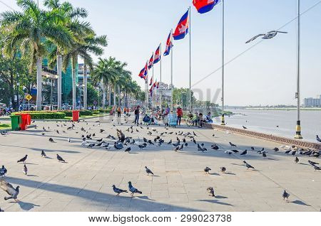 Phnom Penh, Cambodia - April 9, 2018: Preah Sisowath Quay, A Riverside Public Promenade Along The To