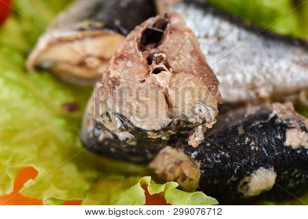 Macro Shot. Pieces Of Sardine Iwashi On Lettuce Leaves.