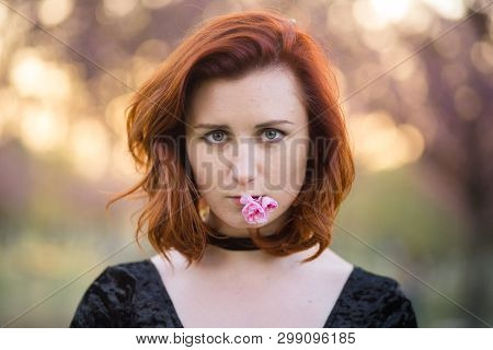 Face Portrait Close Up - Happy Young Travel Dancer Woman Enjoying Free Time In A Sakura Cherry Bloss
