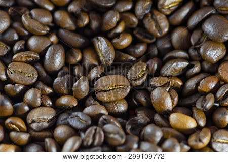 Coffee Beans Closeup. Roasted Coffee Beans Background. Horizontal Macro Photography