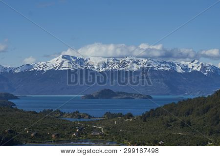 Landscape along the Carretera Austral next to the azure blue waters of Lago General Carrera in Patag