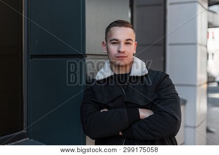 Young Handsome Man In Vintage Black Jacket With White Collars In A Stylish T-shirt Posing Outdoors N