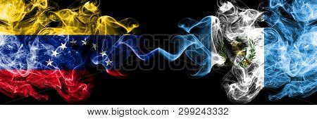 Venezuela Vs Guatemala, Guatemalan Smoky Mystic Flags Placed Side By Side. Thick Colored Silky Smoke