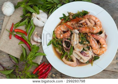 Thai Food; Stir Fired Seafood With Basil. Thai Famaous Traditional And Original Spicy Dish