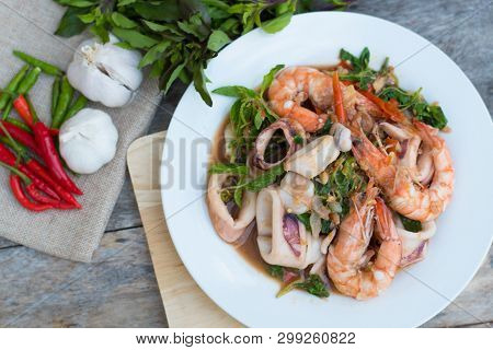 Thai Food; Stir Fired Seafood With Basil. Thai Famaous Traditional And Original Spicy Dish