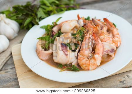 Thai Food; Stir Fired Seafood With Basil. Thai Famaous Traditional And Original Spicy Dish