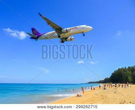 Phuket, Thailand - Apr 4, 2019. Hs-txj Thai Smile Airbus A320 Landing Above The Sand Beach Near Phuk