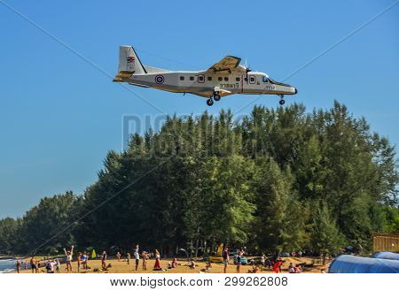Phuket, Thailand - Apr 4, 2019. Royal Thai Navy Dornier Do-228 (reg. 1112) Landing Above The Sand Be