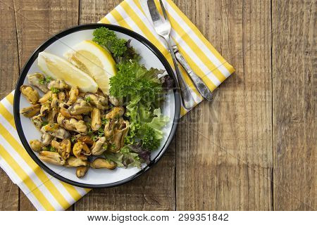Peeled Mussels With Fresh Lemom. Healthy Seafood, Natural Sunlight Wooden Rustic Table