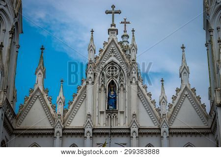 Our Lady Of Dourdes Church Top View With Blue Sky Which Is At Thirssur.