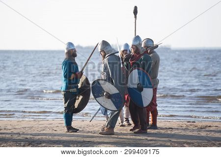 Slavic Warriors Reenactors With Wearpons And Shields Getting Ready For Training Outdoors At Seaside