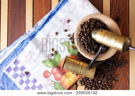 Coffee Ready To Be Milled With Old Grinder