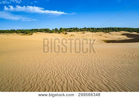 White Sand Dune, Mui Ne, Vietnam. Beautiful Scenery Of Desert Area With Blue Sky.