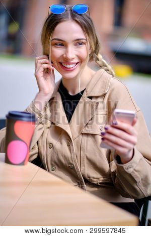 woman using smartphone in caffee shop. smart phone or mobile