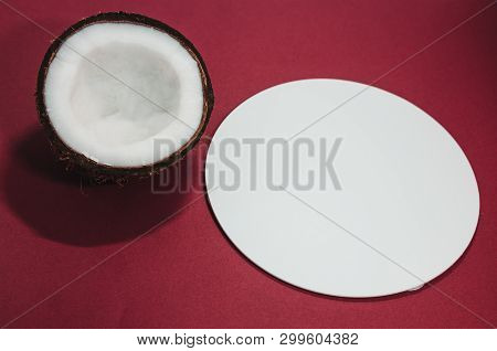 Rape Half Of The Coconut With Copy Space. Moke Up With Fresh Coconut  Background . White Exotic Frui