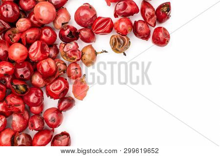 Lot Of Whole Peruvian Pink Pepper Copyspace Flatlay Isolated On White Background