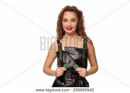 Casino Concept. Portrait Of Young Pretty Caucasian Woman, Playing In Casino. Roulette, Poker Chips, 