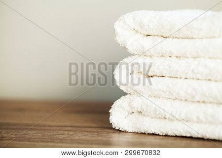 Spa. White Cotton Towels Use In Spa Bathroom. Towel Concept. Photo For Hotels And Massage Parlors. P