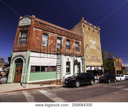 Jerome, Arizona, Usa 04/21/2019 The Conner Hotel And Spirit Lounge Bar Under Blue Skies In Spring Ti