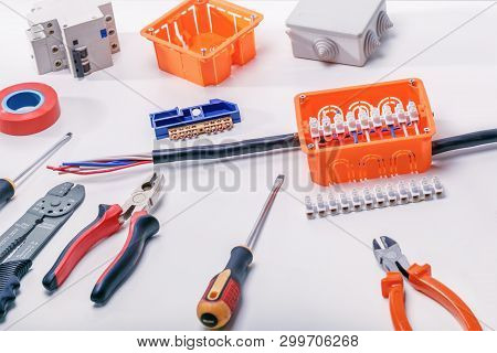 Electrical Connectors With Wires, Junction Box And Different Materials Used For Jobs In Electricity.