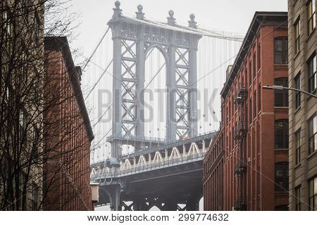 The Famous View Of The Manhattan Bridge At Dumbo In The Streets Of Brooklyn, New York