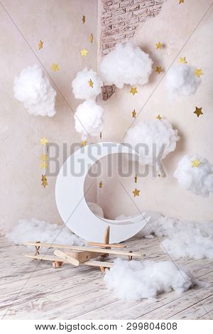 Interior Of The Light Studio, Decorated With The Moon (month), Stars, Clouds And A Wooden Plane, Vin