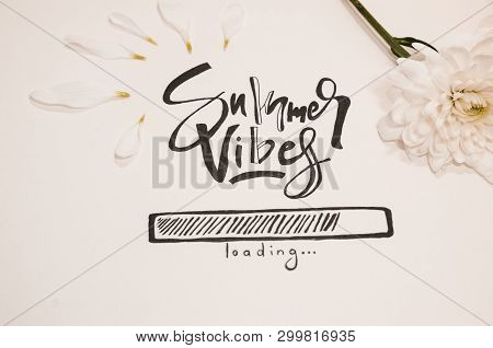 Hello Summer Concept.  A White Paper Where Is Wtitten With Nice Handwriting - Summer Vibes Loading. 