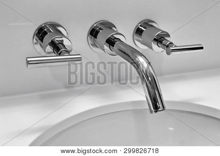 Faucet in B/W	taken in a hotel bathroom